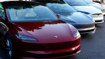 Tesla vehicles are displayed at the AutoMobility LA Auto Show,Thursday, Nov. 21, 2024, in Los Angeles.