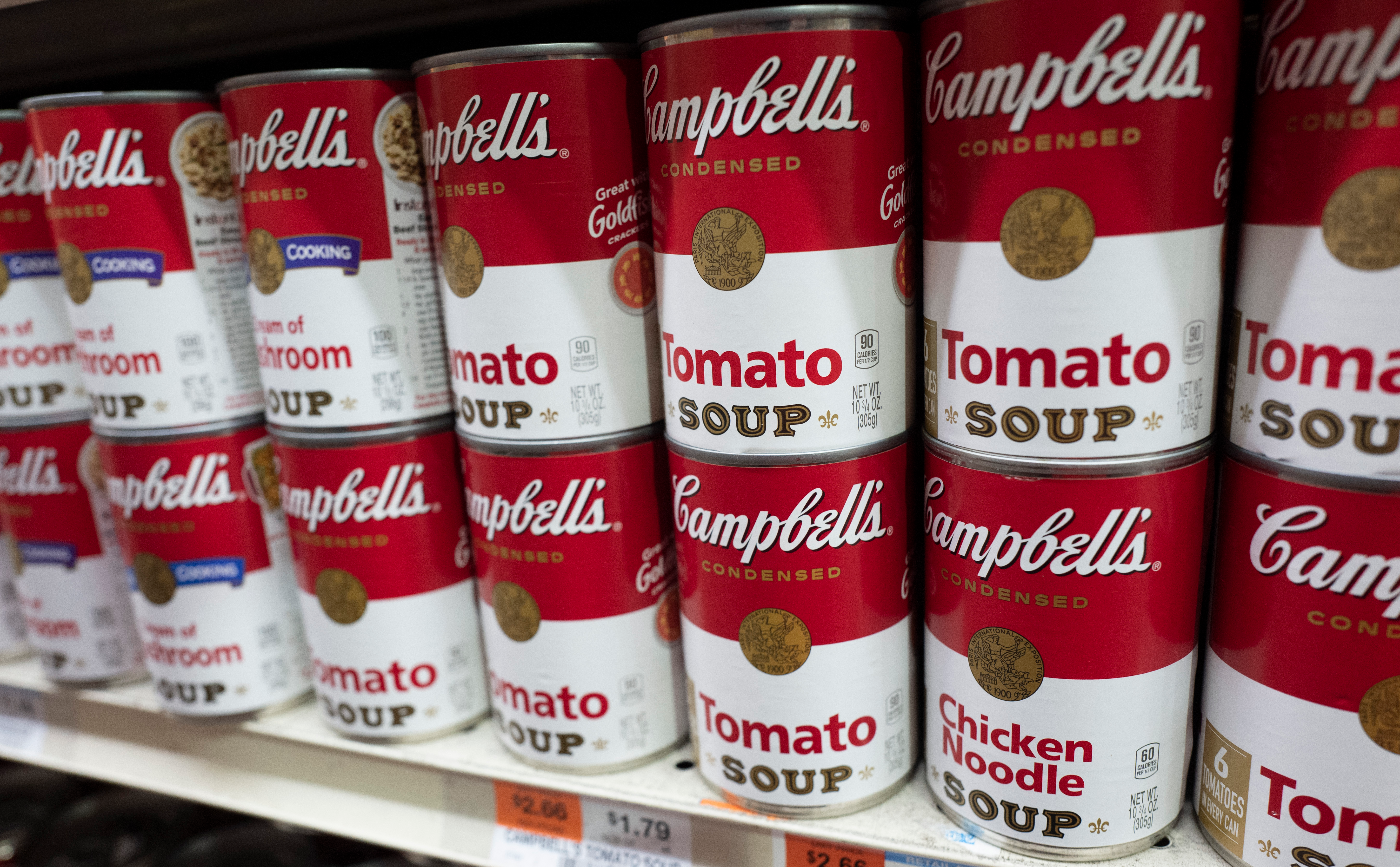 Cans of Campbell's soup are displayed in a supermarket, March 25, 2021, in New York.
