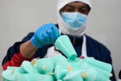 A worker packages popsicles at an artisanal factory in Salcedo, Ecuador, Nov. 28, 2024.