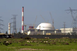 The reactor building of Iran's nuclear power plant and electricity poles are seen, at Bushehr, Iran, 750 miles (1,245 kilometers) south of the capital Tehran, Iran, Feb. 27, 2005.