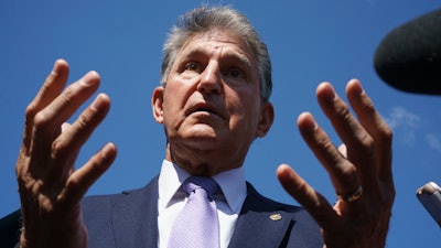 Sen. Joe Manchin, D-W.Va., speaks to reporters at the Capitol in Washington, Thursday, Sept. 30, 2021. Manchin will deliver his final speech on the floor of the Senate today, Tuesday, Dec. 3, 2024.