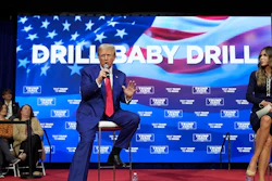 Republican presidential nominee former President Donald Trump speaks at a campaign town hall at the Greater Philadelphia Expo Center & Fairgrounds, Oct. 14, 2024, in Oaks, Pa., as moderator South Dakota Gov. Kristi Noem listens.