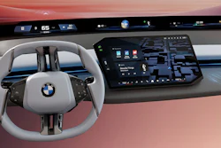 This photo provided by BMW shows the company's new Panoramic iDrive interface. It features a dash-spanning display atop the dash to help drivers better access controls and information with less distraction.
