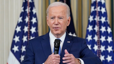 President Joe Biden answers questions from reporters as he speaks in the State Dining Room of the White House in Washington, Nov. 9, 2022.
