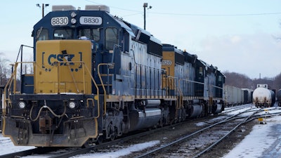 CSX locomotives rest together on tracks at CSX North Framingham Yard, Tuesday, Jan. 24, 2023, in Framingham, Mass.
