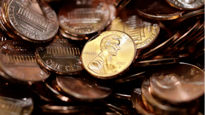 Freshly-made pennies sit in a bin at the U.S. Mint in Denver on Aug. 15, 2007.