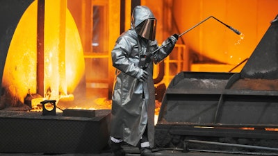 A steel worker is seen during a visit of EU Commissioner for Prosperity and Industrial Strategy Stephane Sejourne at the Thyssenkrupp steelworks in Duisburg, Germany, after the EU Steel Action plan was presented, Thursday, March 20, 2025.