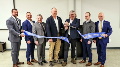 Pictured from left to right: Dr. Phil Stracener, X-Bow Director, Global Facility Solutions, Andrew McLain, Roebbelen Vice President, Dr. Phillip Cole, NSWC IHD Energetics Manufacturing Department Head, Ashley Johnson, NSWC IHD Technical Director, Jason Hundley, X-Bow CEO, Michael Beekwilder, Engineer, NSWC IHD, and Mike Bender, X-Bow COO.