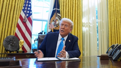 President Donald Trump speaks to reporters in the White House, Feb. 4, 2025.