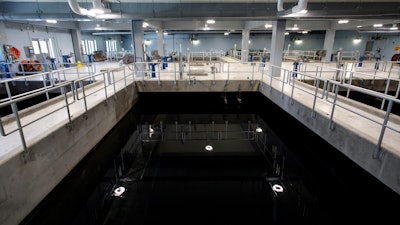 Water is processed through carbon filters inside large reservoirs designed to remove forever chemicals, known as PFAS, at Sweeney Water Treatment Plant in Wilmington, N.C., Monday, April 28, 2025.