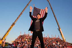 Tesla and SpaceX CEO Elon Musk walks to the stage to speak at the Butler Farm Show, Oct. 5, 2024, in Butler, Pa.