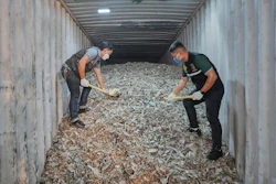 Thai officials show samples of illegally imported electronic waste from the United States which they said they seized at Bangkok Port during a press conference in Bangkok, Thailand, Wednesday, May 14, 2025.