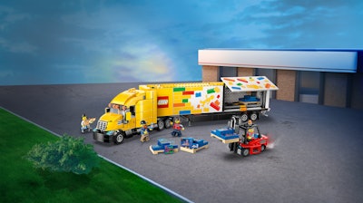 A LEGO truck being unloaded.