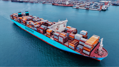 A container ship sails off a port in Qingdao in east China's Shandong province on Wednesday, May 7, 2025.