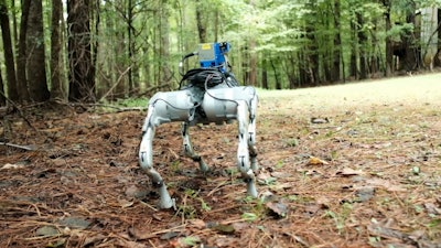 This screengrab shows a quadruped robot integrated with multiple sensing modalities, including an RGB camera, LiDAR, inertial sensors, and, notably, contact microphones and tactile sensors.
