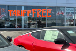 A 'Tariff Free' sign displayed at a car dealership in Totowa, N.J., April 30, 2025.