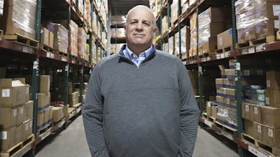 Rick Woldenberg, CEO of Learning Resources, an educational toy company whose products are manufactured in China, stands at a warehouse in Vernon Hills, Ill., April 11, 2025.