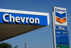 Chevron logos are displayed at a gas station in Columbus, Miss., Monday, Oct. 23, 2023.