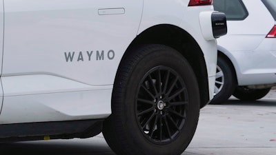A Waymo vehicle drives in San Francisco, Thursday, July 3, 2025.