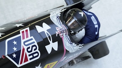 Kaysha Love and Emily Renna, of the United States, speed down the track during the first run of the 2-woman bobsleigh, at the Bobsleigh World Cup in Innsbruck, Austria, Sunday, Jan. 19, 2025.