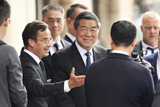 Swedish prime minister Ulf Kristersson, center left, gestures as he greets Chinese vice prime minister He Lifeng, center, at Rosenbad before trade talks between the US and China in Stockholm, Sweden, July 28, 2025.