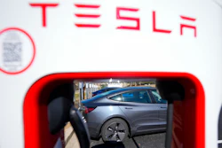 A Tesla level three Electric vehicle charger is visible, Feb. 2, 2024, in Kennesaw, Ga., near Atlanta.