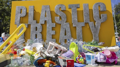 Plastic items are seen on Place des Nations in front of the European headquarters of the United Nations in Geneva, Switzerland, Monday, Aug. 4, 2025 before the second segment of the fifth session of the Intergovernmental Negotiating Committee on Plastic Pollution (INC-5.2).