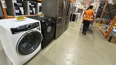 Clearance home appliances are displayed at a retail store in Vernon Hills, Ill., Thursday, Aug. 7, 2025.