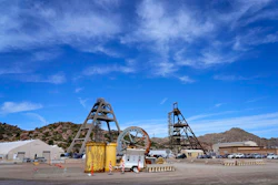 Mine shafts 10, left, and 9, right, tower over the Resolution Copper Mining Company facility, June 9, 2023, in Miami, Ariz.