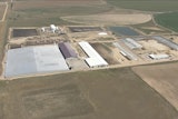 This image taken from video provided by DENVER7 shows a dairy in Keenesburg, Colo., on Thursday, Aug. 21, 2025, where authorities say six people died from an apparent accident involving exposure to gas.