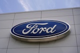 The Ford logo is seen above the entrance to the Ford Motor Company Kentucky Truck Plant, April 30, 2025, in Louisville, Ky.