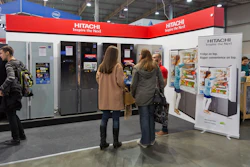 Hitachi booth at a trade show.