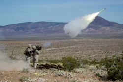 Military personnel firing the Stinger missile.