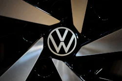 The logo of German car manufacturer Volkswagen is pictured at Volkswagen's transparent factory in Dresden, Germany, on May 14, 2025.