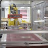 Lengths of glass move down a quality control line during a tour of Corning's iPhone glass manufacturing facility Friday, Sept. 12, 2025, in Harrodsburg, Ky.