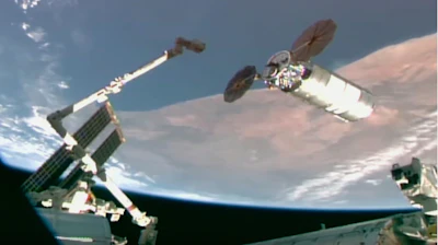 This image provided by NASA shows Northrop Grumman's newly arrived cargo capsule at the International Space Station on Thursday, Sept. 18, 2025.