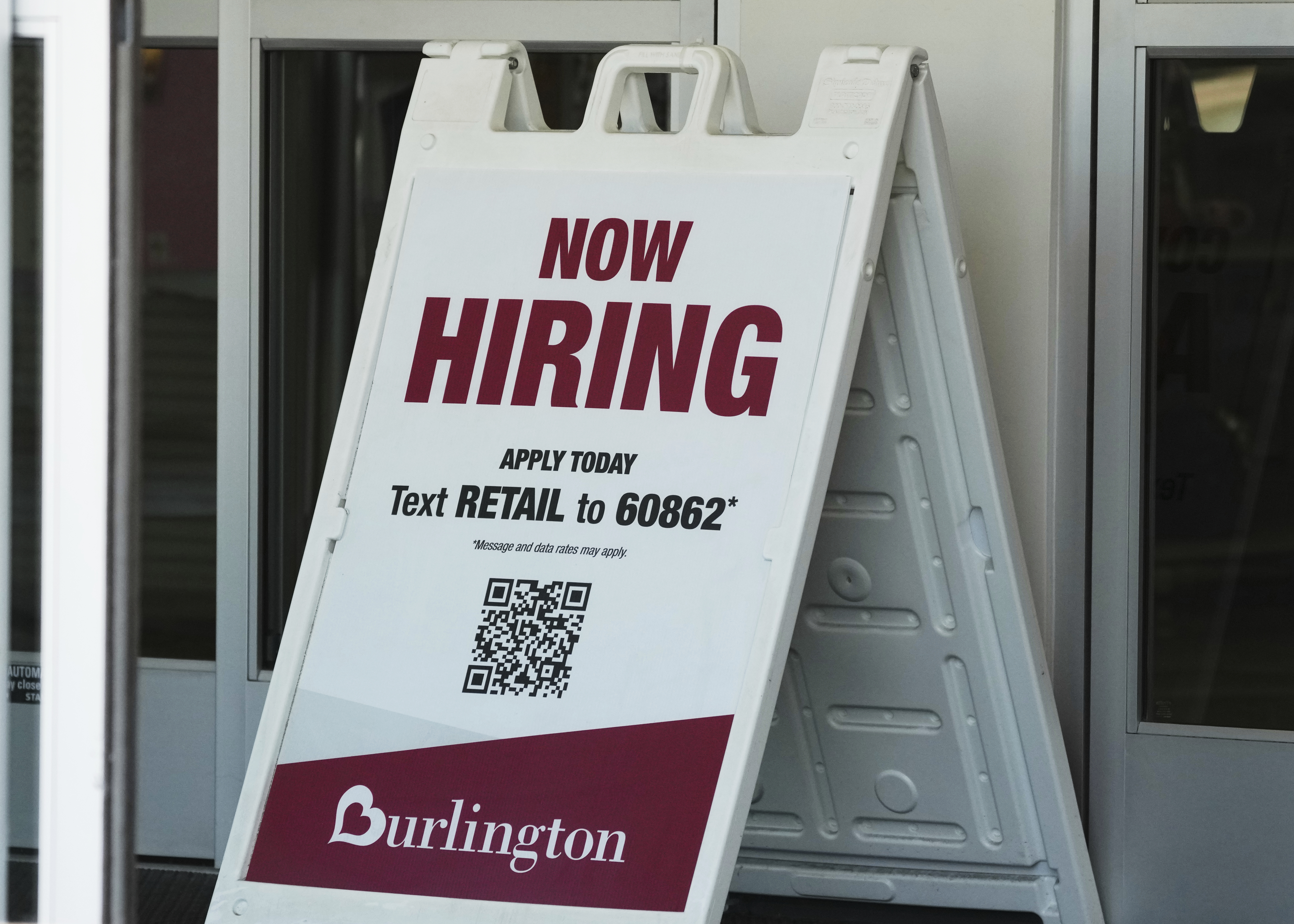 A 'Now Hiring' sign at a retail store in Schaumburg, Ill., Sept. 18, 2025.