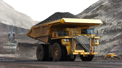 In this April 4, 2013, file photo, a mining dumper truck hauls coal at Cloud Peak Energy's Spring Creek strip mine near Decker, Mont.