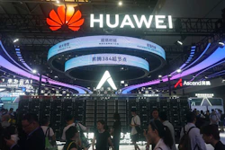 Visitors pass by the Huawei Atlas 900 A3 SuperPoD exhibited at the World Artificial Intelligence Conference in Shanghai, China, July 28, 2025.