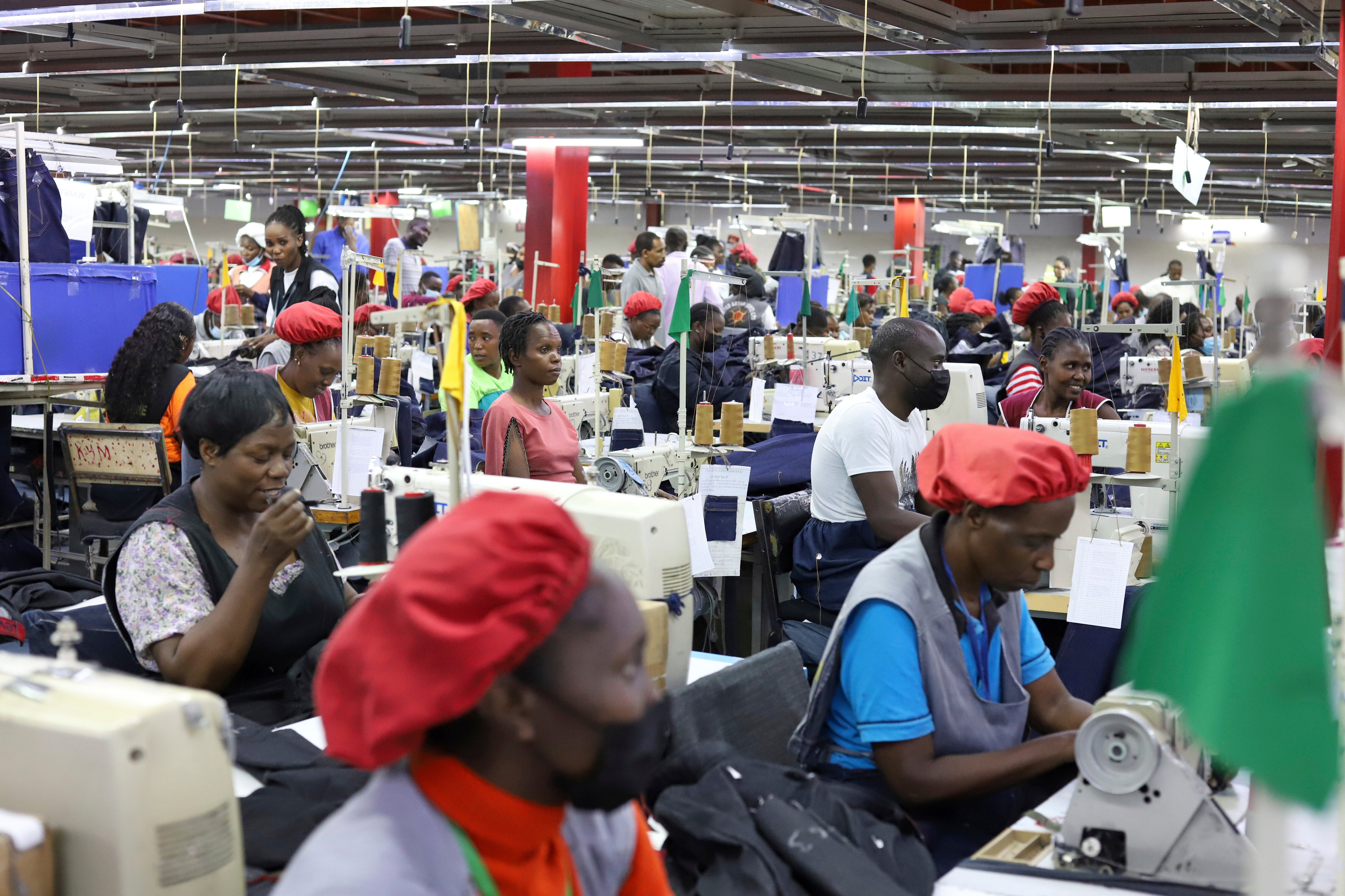 Factory workers operate machines to make garments at United Aryan EPZ Limited in Ruaraka on the outskirts of Nairobi, Kenya, March 21, 2025.