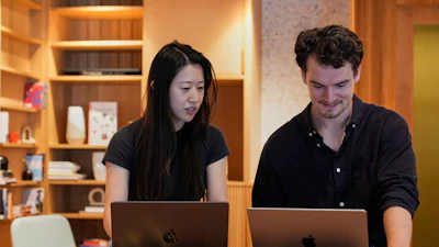 Claude code product manager Cat Wu, left, and Alex Albert, head of Claude relations, work inside Anthropic headquarters in San Francisco, Wednesday, Aug. 27, 2025.