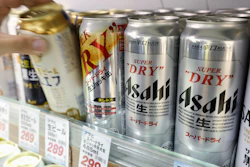 Cans of beer sit on a shelf at a supermarket in Yokohama, near Tokyo Friday, Oct. 3, 2025.