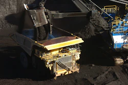 A mechanized shovel loads coal into a haul truck at the Spring Creek mine, in this Nov. 15, 2016 photo, near Decker, Mont.