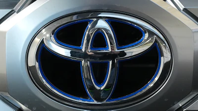 A Toyota logo is seen on a Toyota Tundra HV 4x4 at the Pittsburgh International Auto Show in Pittsburgh, Feb. 15, 2024.