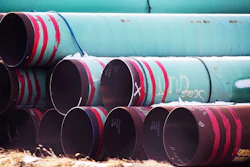 Pipes meant for the Keystone XL pipeline are stored in a field near Dorchester, Neb., Dec. 18, 2020.