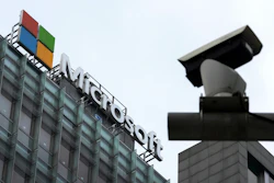 A security surveillance camera is seen near the Microsoft office building in Beijing, July 20, 2021.