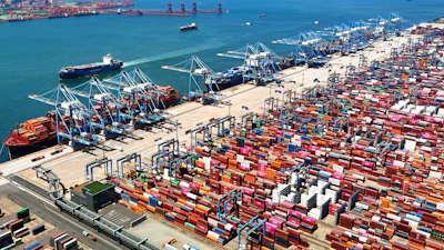 An aerial view of a container port is seen in Qingdao in east China's Shandong province, on June 6, 2024.