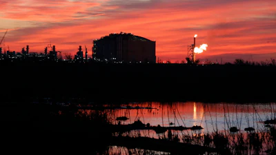 A flare burns at Venture Global LNG in Cameron, La., April 21, 2022.