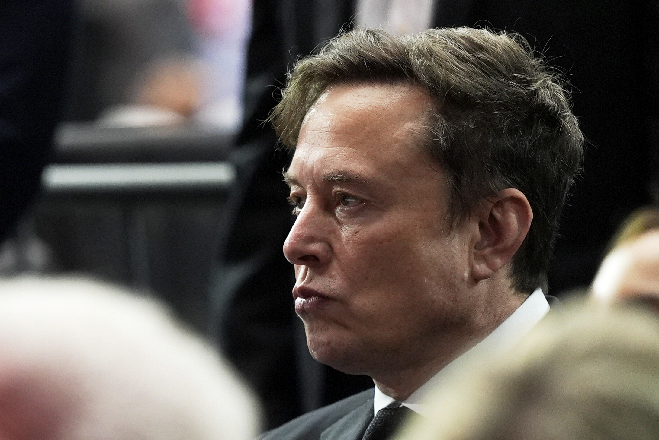 Elon Musk attends a memorial for conservative activist Charlie Kirk, Sunday, Sept. 21, 2025, at State Farm Stadium in Glendale, Ariz.