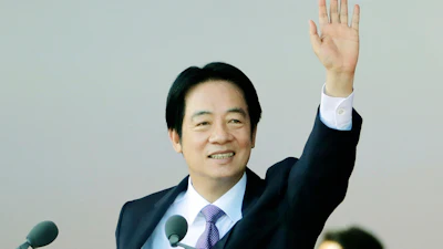 Taiwanese President Lai Ching-te waves during National Day celebrations in front of the Presidential Building in Taipei, Taiwan, Friday, Oct. 10, 2025.
